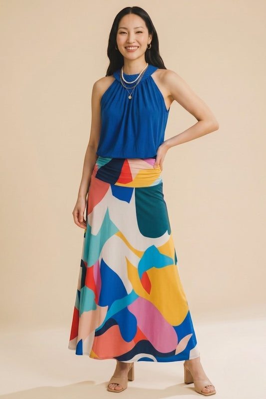 Osanna Creazione Florence long fluid skirt with abstract colorful print and blue halter top, convertible to a bandeau dress.