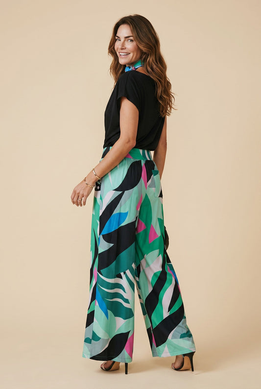 Pantalon ample fluide Camila Osanna Creazione vert et multicolore avec motif abstrait, taille haute élastiquée et poches.