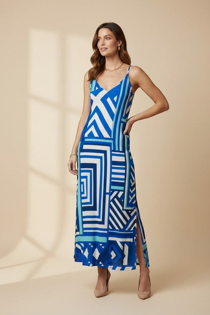 Osanna Creazione blue and white geometric print maxi dress with thin straps and side slits.