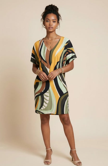 Osanna Creazione Abi short straight dress with V-neck, short sleeves, and a fluid abstract print in green, yellow, brown, and black.