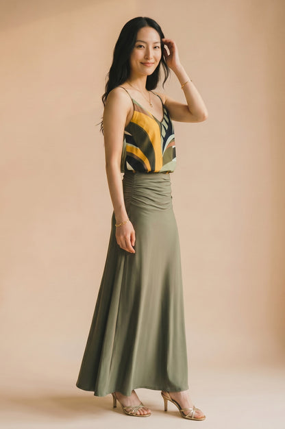 Osanna Creazione women's flowing V-neck camisole with abstract print and ruched waist maxi skirt in olive green.