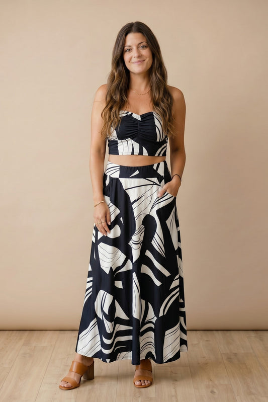 Osanna Creazione black and white abstract print maxi skirt with pockets. Model wears skirt high-waisted.
