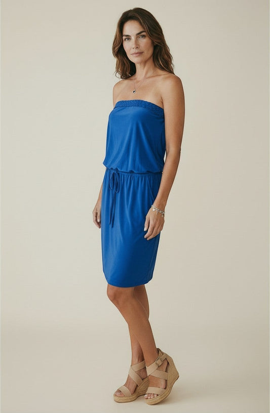 Osanna Creazione blue strapless midi dress with braided bustier detail, drawstring waist, and pockets. Model is wearing wedge sandals.