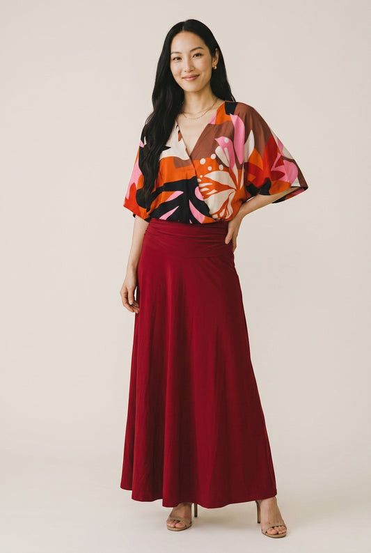 Osanna Creazione Florence long fluid red skirt with a comfortable bandeau waist, versatile for day or evening.