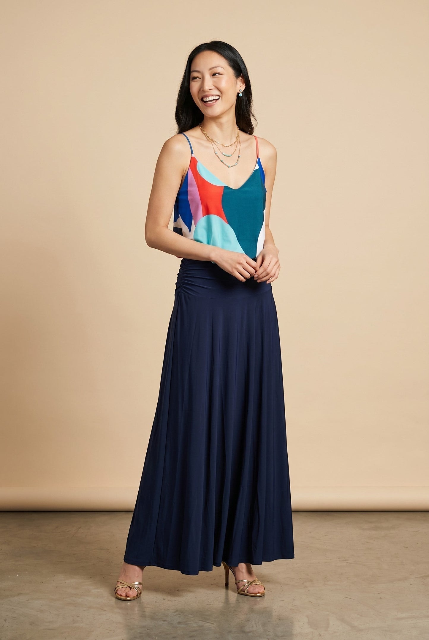 Osanna Creazione navy blue ruched waist maxi skirt with a fluid, floor-length silhouette.