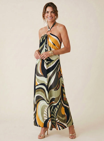 Osanna Creazione robe longue Jilo dos nu, imprimé abstrait multicolore, lien à nouer au cou avec anneau doré, matière fluide.