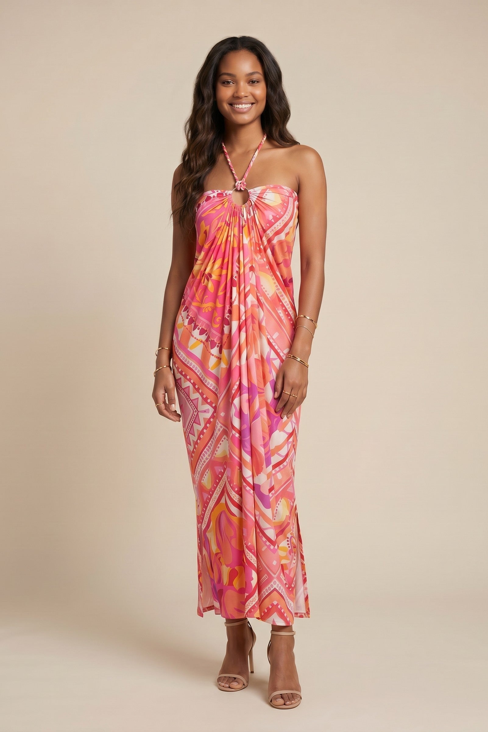 Robe longue drapée Osanna Creazione rose et orange avec un anneau central et un dos nu, imprimé psychédélique.