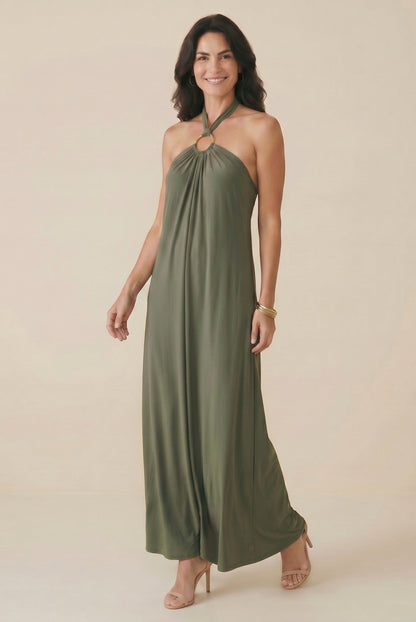 Osanna Creazione robe longue verte kaki dos nu avec anneau doré, matière fluide, style bohème chic.