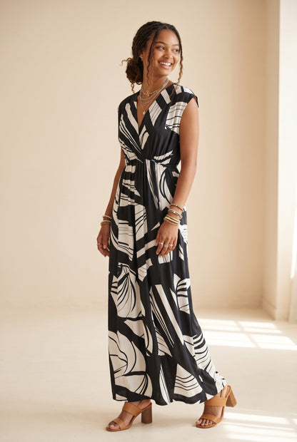 Robe longue empire Baleate noire et blanche à imprimé abstrait, col V, élastique sous poitrine, par Osanna Creazione
