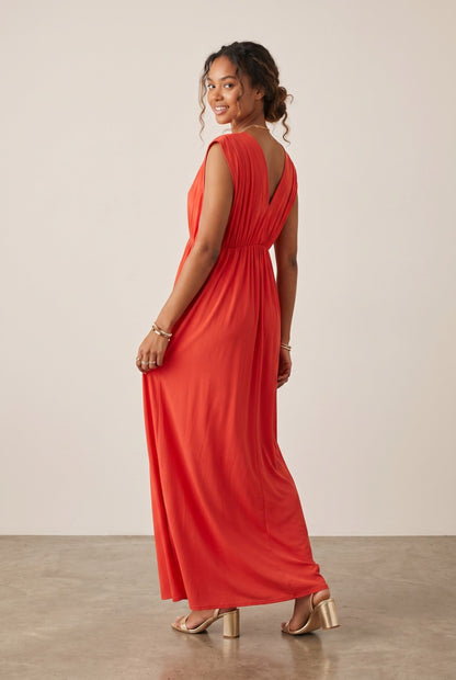 Robe longue empire rouge corail Baleate d'Osanna Creazione, col V, fluide et évasée, taille unique.