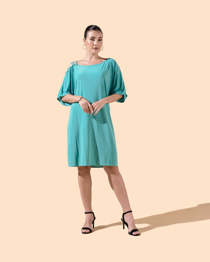 Osanna Creazione teal blue short loose-fit dress with mid-length sleeves and a single strap detail on the shoulder.