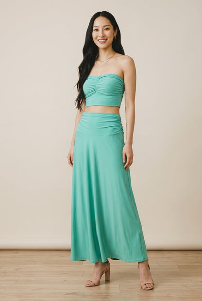 Osanna Creazione turquoise ruched bandeau maxi skirt, fluid and lightweight, versatile for day to night.